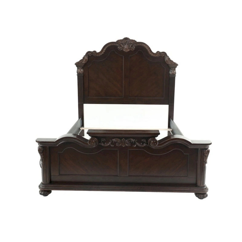 Lit queen en bois superbement sculpté, finition noyer foncé et placage